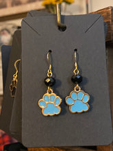 Load image into Gallery viewer, Helena Huskies paw print earrings: goldtone & light blue enamel paw print with black bead
