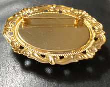 Load image into Gallery viewer, Huge goldtone brooch with serpentine gemstone cabochon
