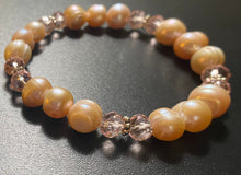Load image into Gallery viewer, Aurora: beautiful peachy-pink freshwater baroque pearl and crystal bracelet