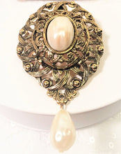 Load image into Gallery viewer, Vintage Avon ornate gold oval brooch / pendant w faux pearl cabochon and teardrop pearl dangle