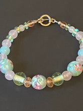 Load image into Gallery viewer, Dreams of Spring rose quartz and floral lampwork glass bead bracelet