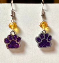 Load image into Gallery viewer, LSU Tigers or UNA Lions sports fan paw earrings: purple glitter enamel paw with optional gold crystal bead.