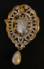 Load image into Gallery viewer, Vintage Avon ornate gold oval brooch / pendant w faux pearl cabochon and teardrop pearl dangle
