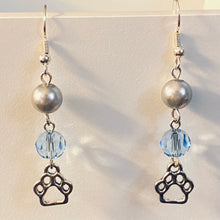 Load image into Gallery viewer, Helena Huskies paw print sports fan earrings withchoice of crystal or pearl bead in team colors
