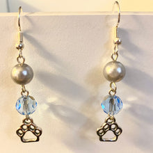 Load image into Gallery viewer, Helena Huskies paw print sports fan earrings withchoice of crystal or pearl bead in team colors
