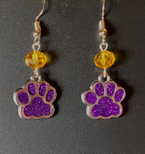 Load image into Gallery viewer, LSU Tigers or UNA Lions sports fan paw earrings: purple glitter enamel paw with optional gold crystal bead.

