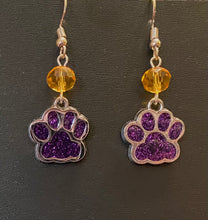 Load image into Gallery viewer, LSU Tigers or UNA Lions sports fan paw earrings: purple glitter enamel paw with optional gold crystal bead.
