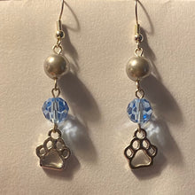 Load image into Gallery viewer, Helena Huskies paw print sports fan earrings withchoice of crystal or pearl bead in team colors
