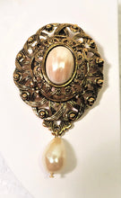 Load image into Gallery viewer, Vintage Avon ornate gold oval brooch / pendant w faux pearl cabochon and teardrop pearl dangle
