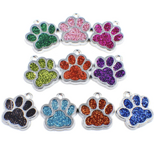 Load image into Gallery viewer, Paw print sports fan earrings: Tigers, Lions, Bulldogs, Wildcats, Huskies, Panthers, Jaguars: choice of team color with or without crystal bead.
