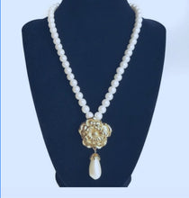 Load image into Gallery viewer, Vintage Avon Summerset Tudor Rose Gripoix gold and faux pearl necklace
